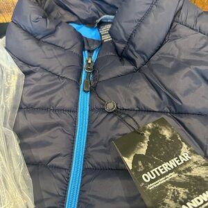 Navy Puffer Jacket with Blue Accents